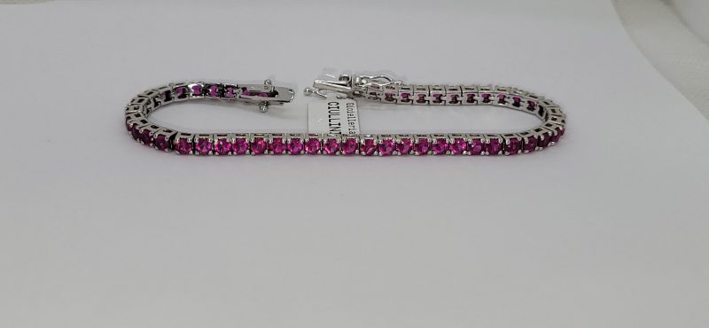 Bracciale in arg 925 modello tennis con zirconi fucsia.